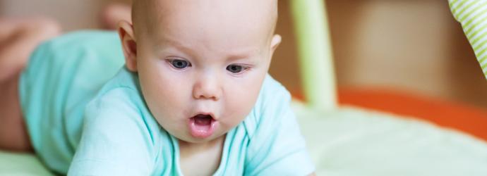 baby playing on the floor