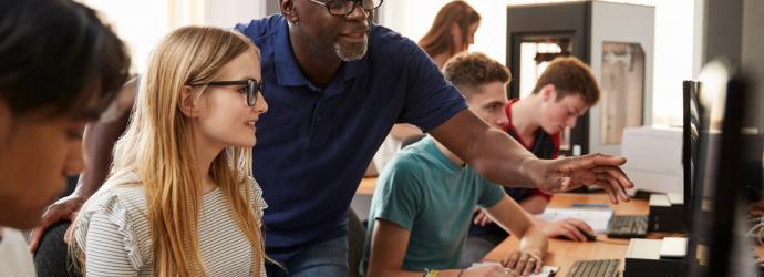 secondary_school_pupils_at_computers_with_teacher