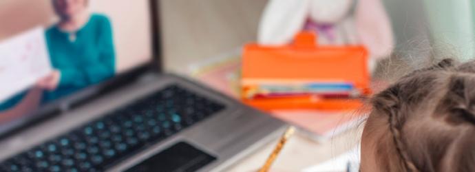 young child attends online class