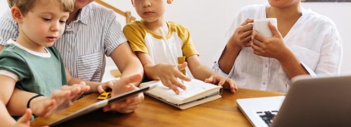 Children at table with adult