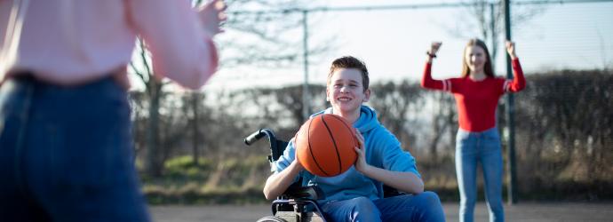 stock_image_of_child_playing_wheelchair_basketball