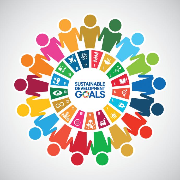 Group of people represented as colourful icons stood in a circle around the word "sustainable development goals"
